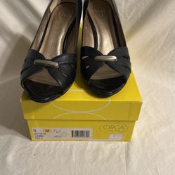 Brand new black wedge dress shoe from circa Joan and David