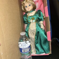 New In Box Porcelain doll.