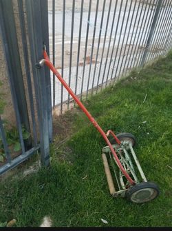 Vintage push lawnmower works can use for yard or