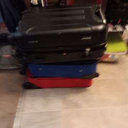 3 Small Suit Cases