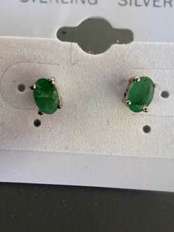 .925 Sterling stud earrings with oval emerald natural