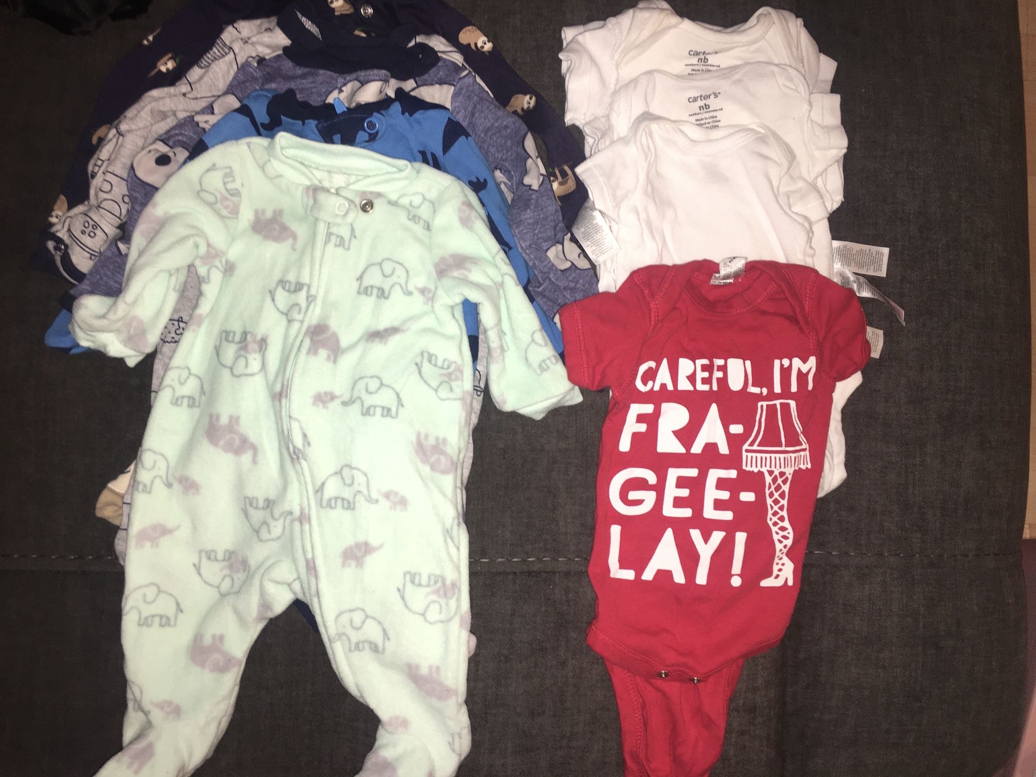 All Newborn Size Footed Onesie