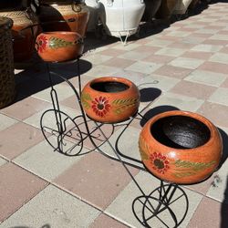 New Bike And Flower Pots Made Out Of Clay And Iron 