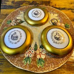 JUEGO DE PLATOS DE PARED REDONDO DE PORCELANA FILETEADA EN DORADO