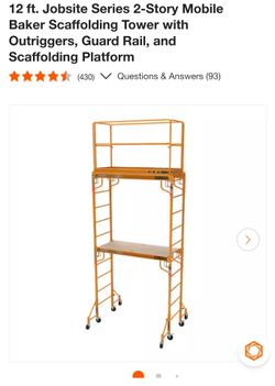 Used Scaffolding Tower with Outriggers, Guard Rail, and Scaffolding Platform