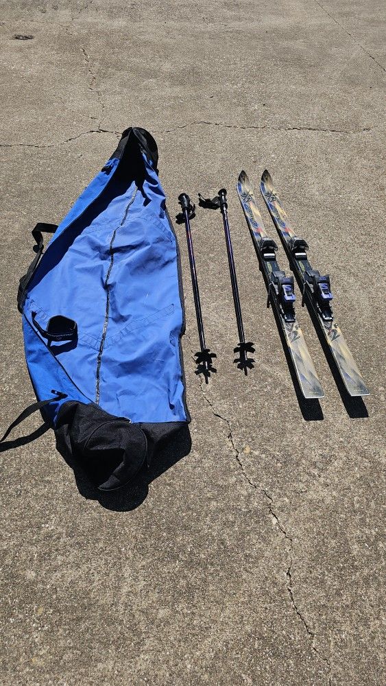 Rossignol 148cm skis with Quadrax bindings, Scott ski poles...