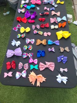 GIRLS BOWS.. ONE DOLLARS EACH.. CHECK OUT MY PAGE FOR MORE..
