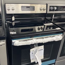 New Scratch And Dent GE 4 Burner Glass Top Stainless Steel Range. 1 Year Warranty 