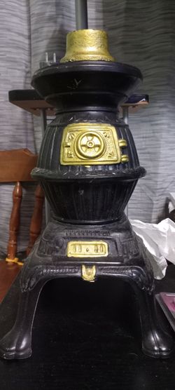 Antique replica wood burning stove