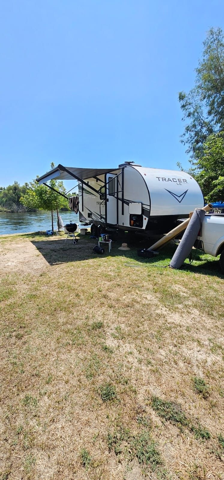 2021 RV IN PERFECT CONDITION NICE AND CLEAN SUPER EQUIPPED,MICROWAVE, REFRIGERATOR,STOVE,GRILL,QUEEN BED,TWIN BED,STORAGE, SLIDE SIDES,AC,HEATER,SHOWE
