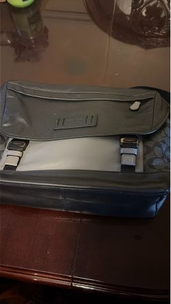 Black an gray coach messenger bag
