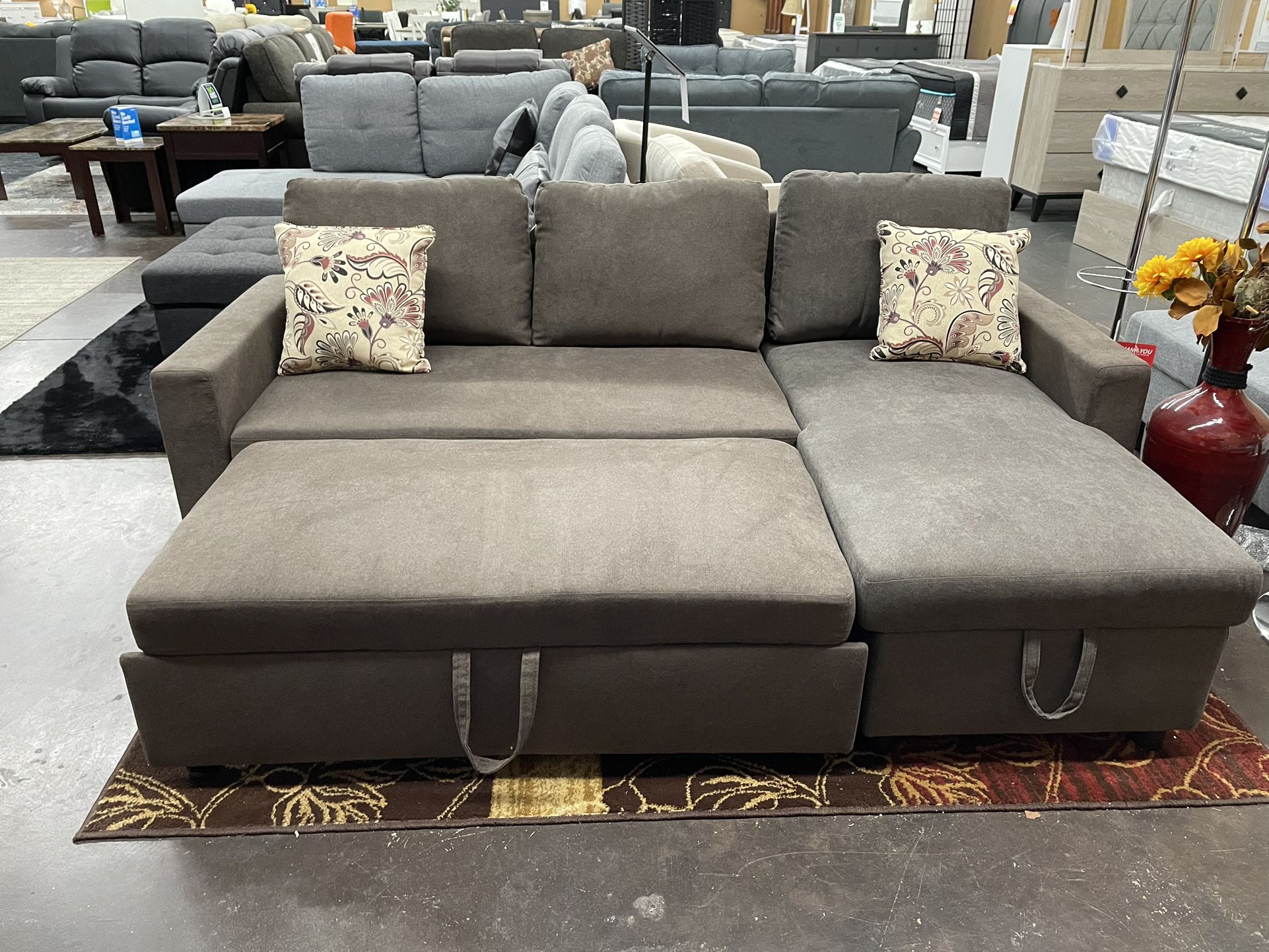 Reversible Sectional Sleeper With Pull Out Ottoman