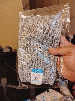 pair of Cut Resistant Sleeves with a CE Level 5 protection rating in size Large.