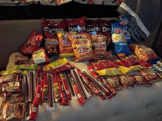 Doritos Ruffles flaming hot stuff beef jerky grandma's cookies pistachios sunflower seeds and assortment of goodies medium sized bags and regular larg