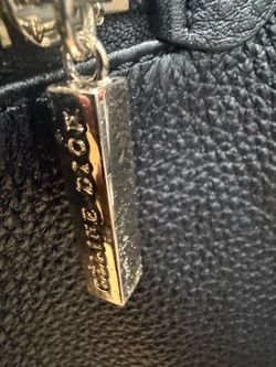 Celine Dion black leather bag