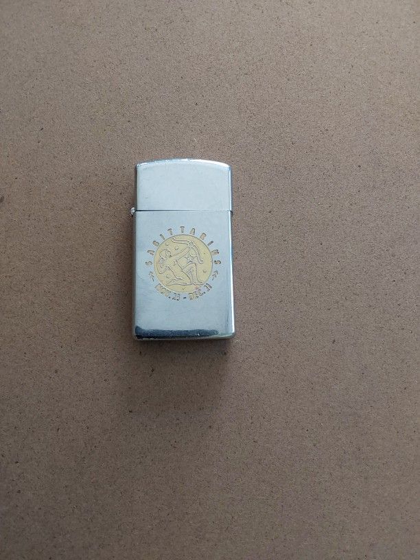 1983 Slim Zippo with Sagittarian Logo