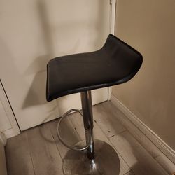 Compact Swivel chair. No back. Adjustable Height