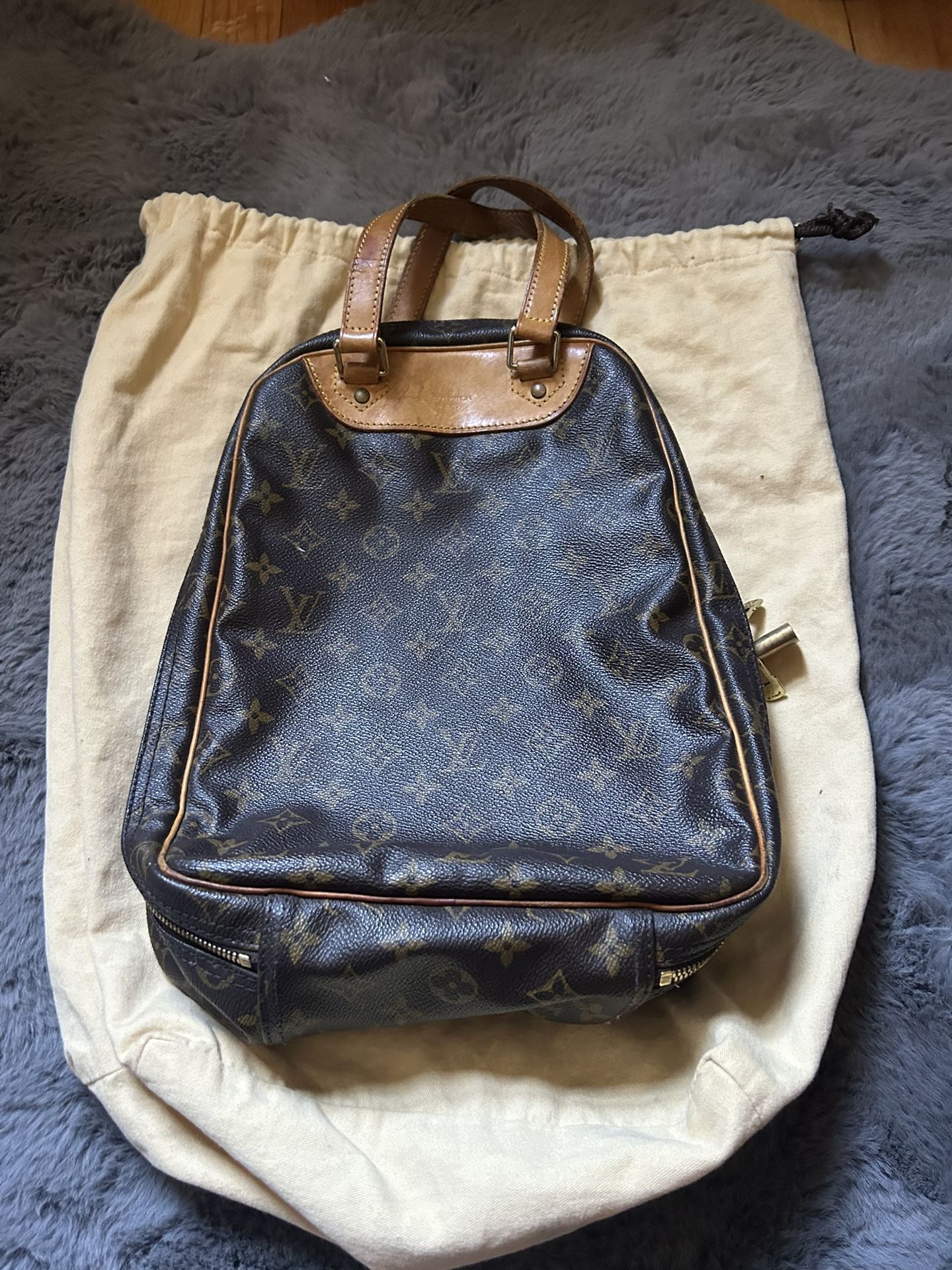 LV excursion handbag