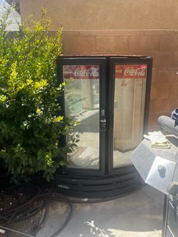 Vintage double door, Coca-Cola glass front refrigerator