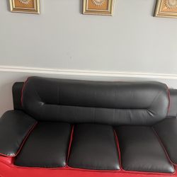 Two New Clean Black And Red Sofa’s.