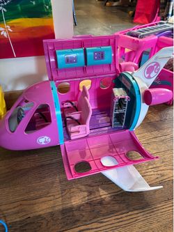 Large lot of Barbie toys! Airplane, ambulance, mini camper, large camper, and sports car!