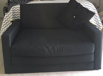BLACK 2 SEATER - TURNS INTO BED