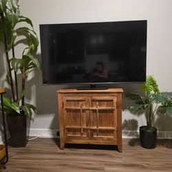 Tv, coffee table, and bar stool