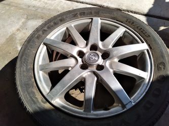 4 Jaguar rims and tires