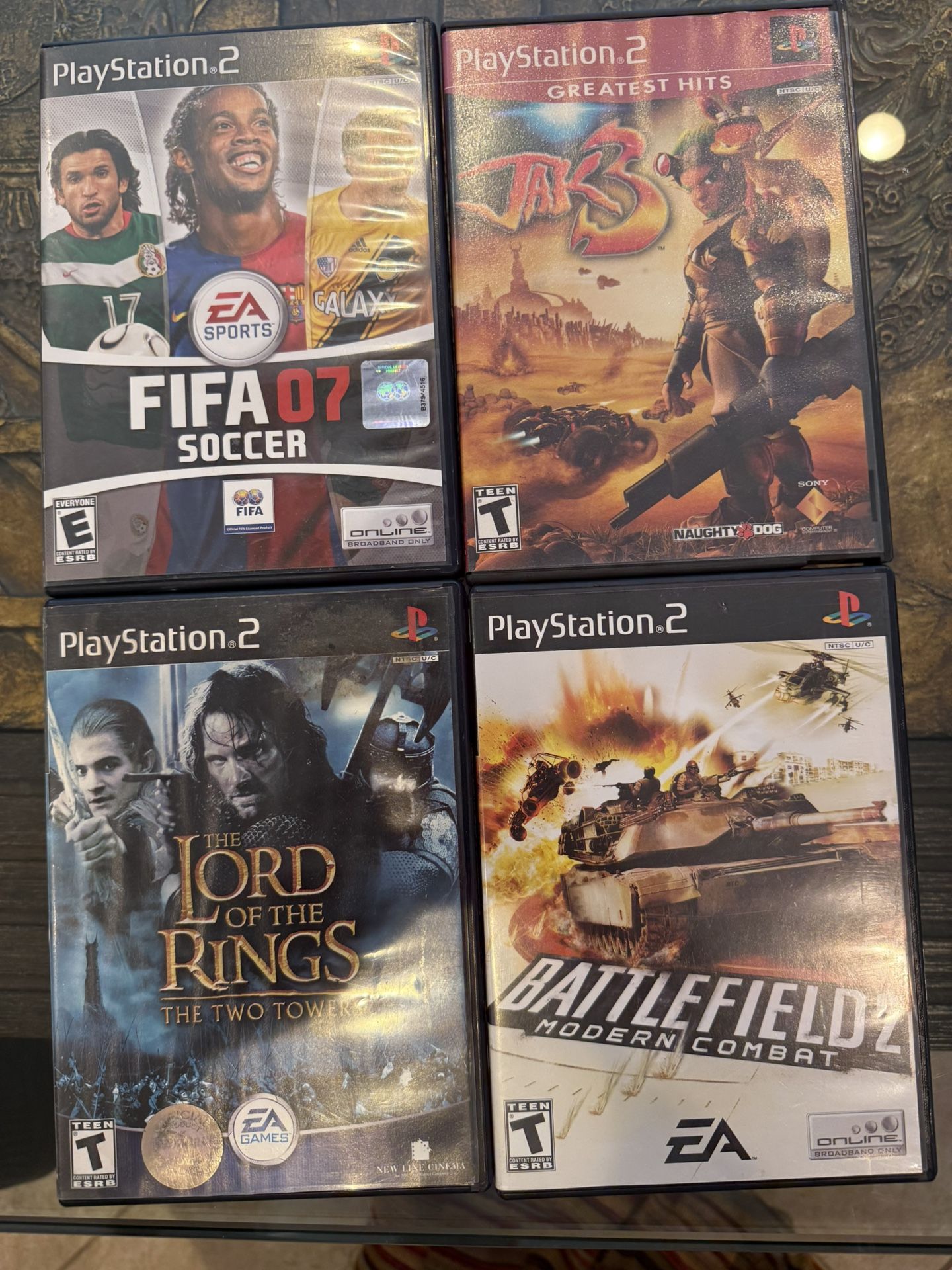 4 PS2 Games - lord of the rings two towers | jack 3 | Battlefield 2 | FIFA 07