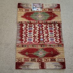 NEW Area Rug 24" x 36" geometric pattern red, green and beige.