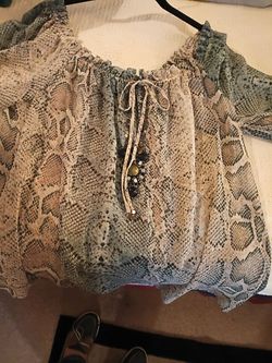 Vintage "Moda International" A Victoria Secret Catalogue brand. A 100% polyester snake skin semi sheer blouse.