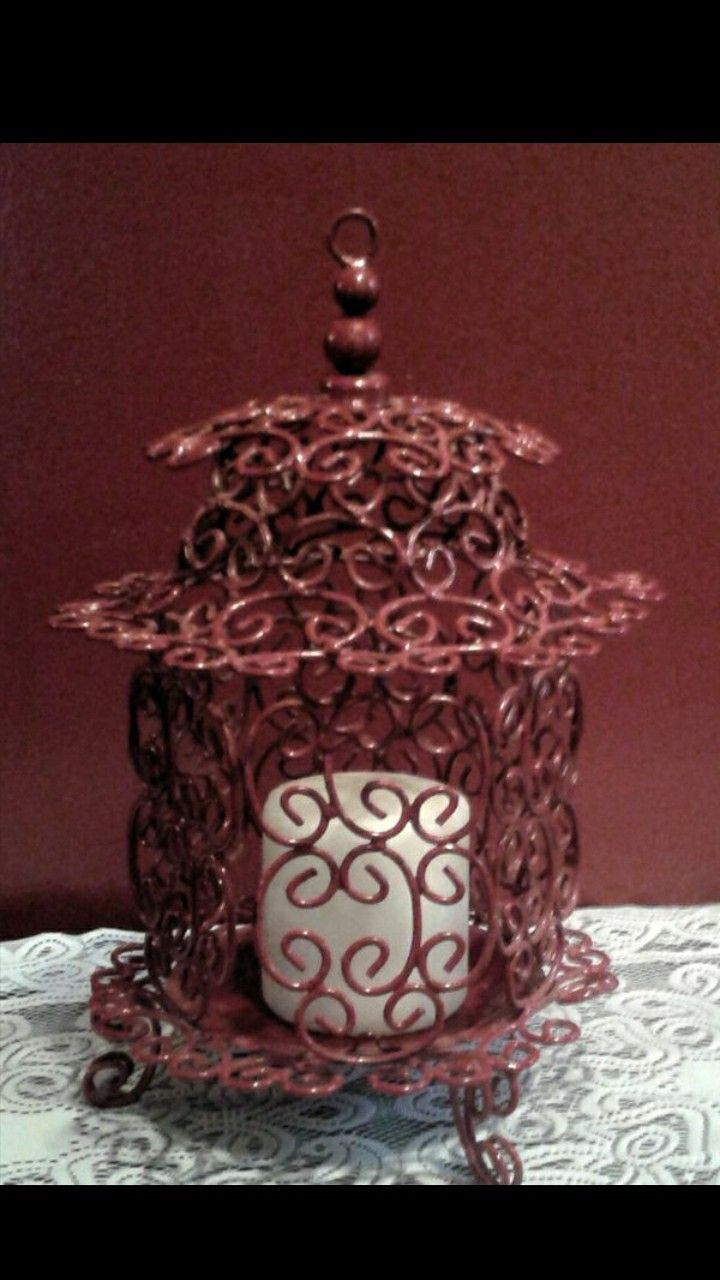 Very pretty red metal candle holder