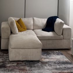 Beautiful 79'' Wide modern cream corduroy modular sofa with chaise and ottoman in great condition