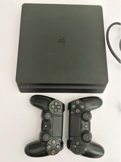 PlayStation 4 with 2 controllers