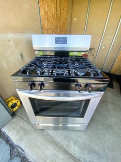 Frigidaire gas stove 4 burners stainless st.  30”