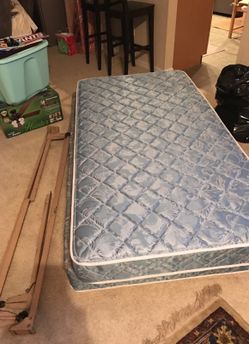 Twin size mattress and spring along with frame