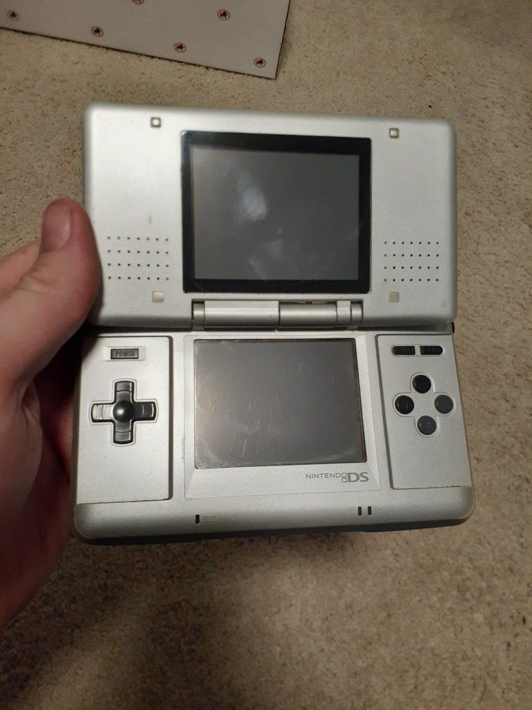 Ninetendo DS. System And Games. No Charger.