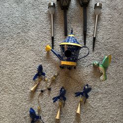 New, decorative birdhouse and lanterns, all for $20