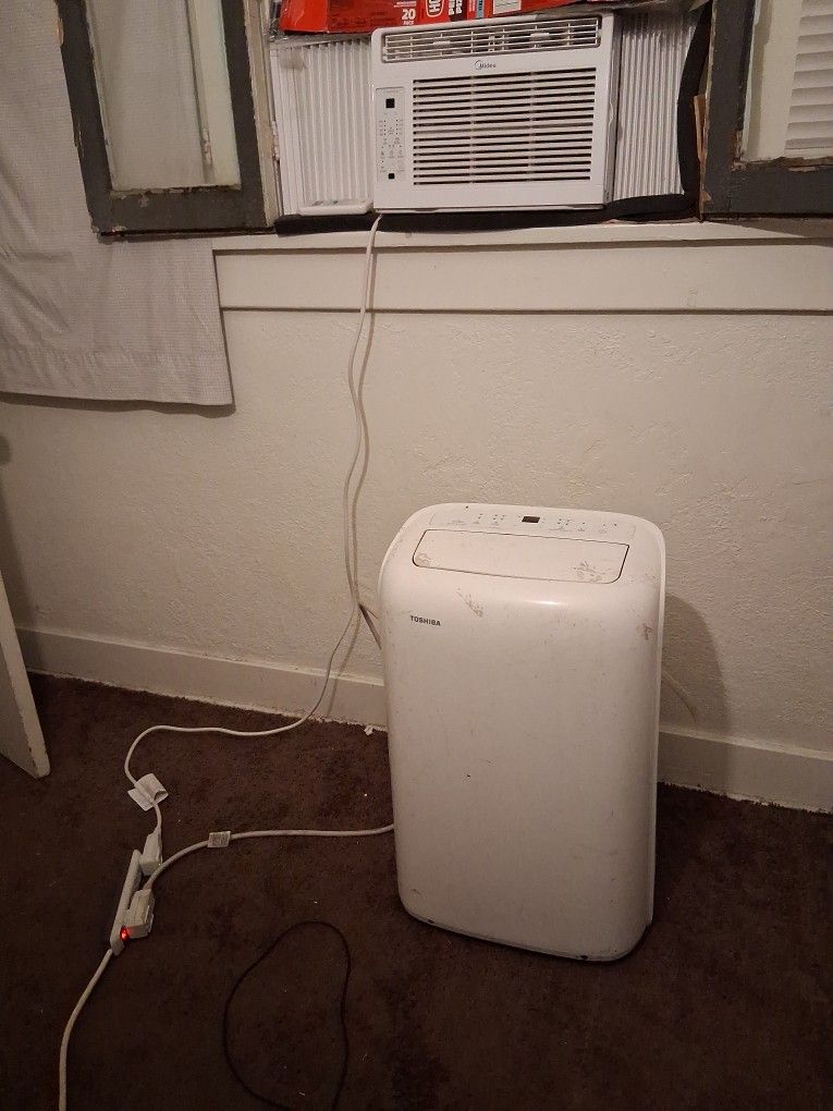 TOSHIBA AC PORTABLE COOLER and MIDEA AC Window Both Working Condition With Attactments and Remote! Im Moving! Need Gone! $150. Or Best Offer!!