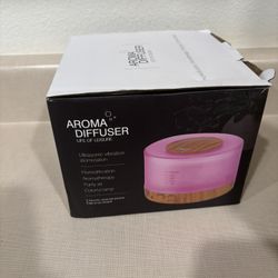 Aromatic  Humidifier With 5 Bottles Of Oil