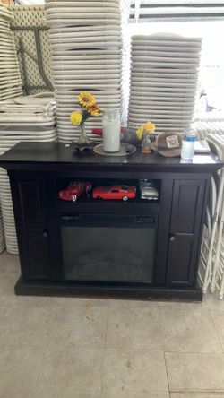 Stand with fireplace