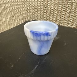 vintage Akro Agate slag glass flower pot featuring a ribbed, banded top and a blue and white marbled swirl pattern.  Manufacturer: The Akro Agate Comp