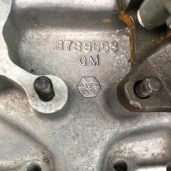 Rebuilt carburetor manifold for a 57 Corvette 283 engine