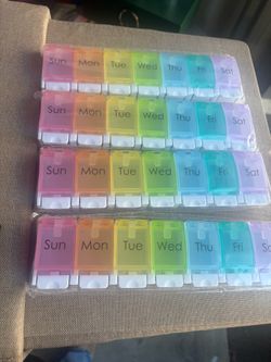 Pill containers