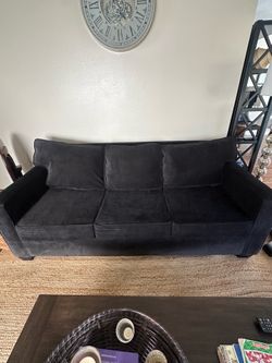beautiful black sofa with sleeper
