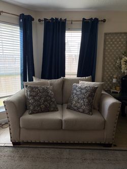 Grey Loveseat with Nailhead Trim