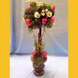 

Christmas Topiary tree 24” high x 8” diameter-
