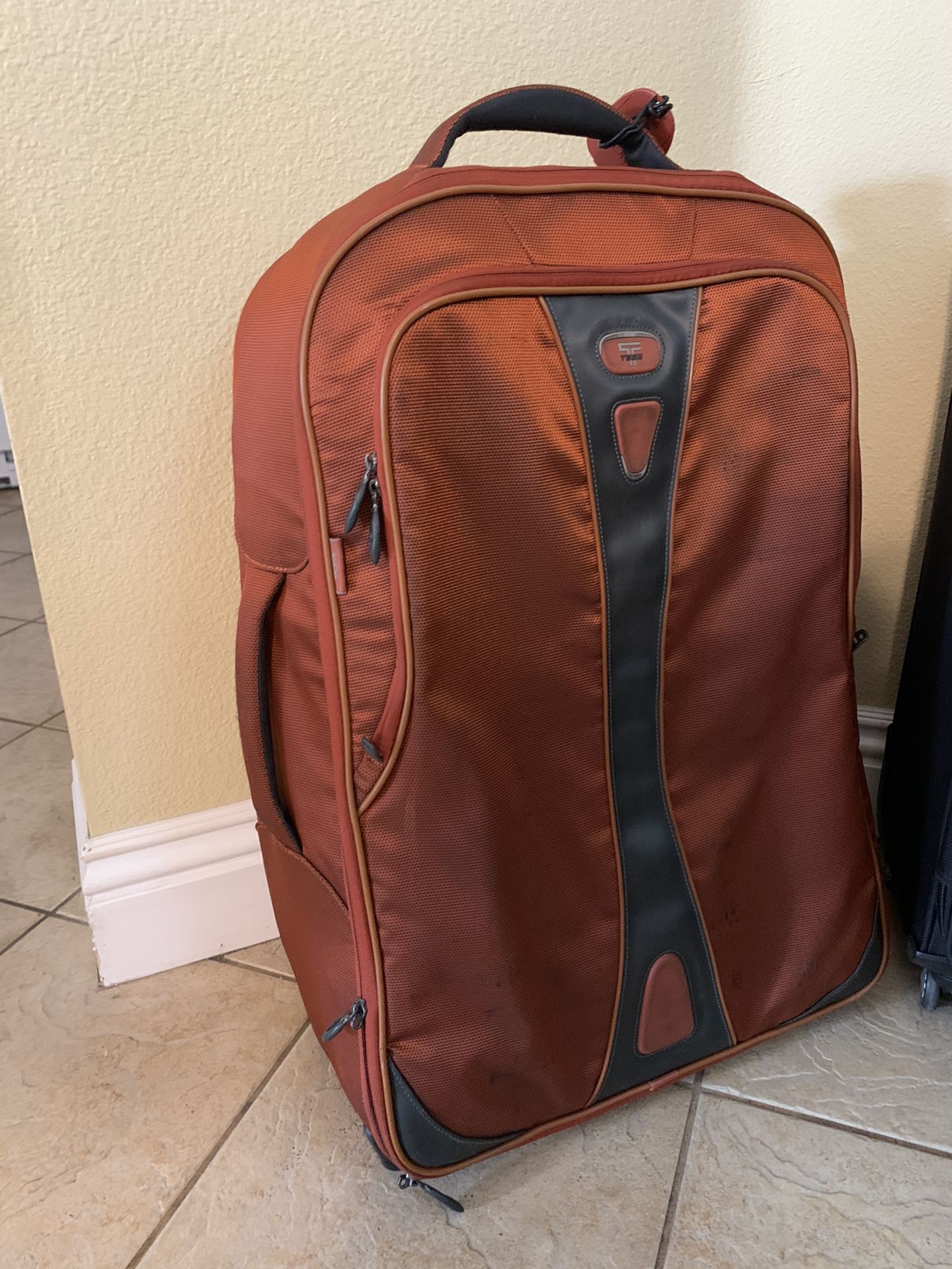 Tumi Orange 2-Wheel Luggage