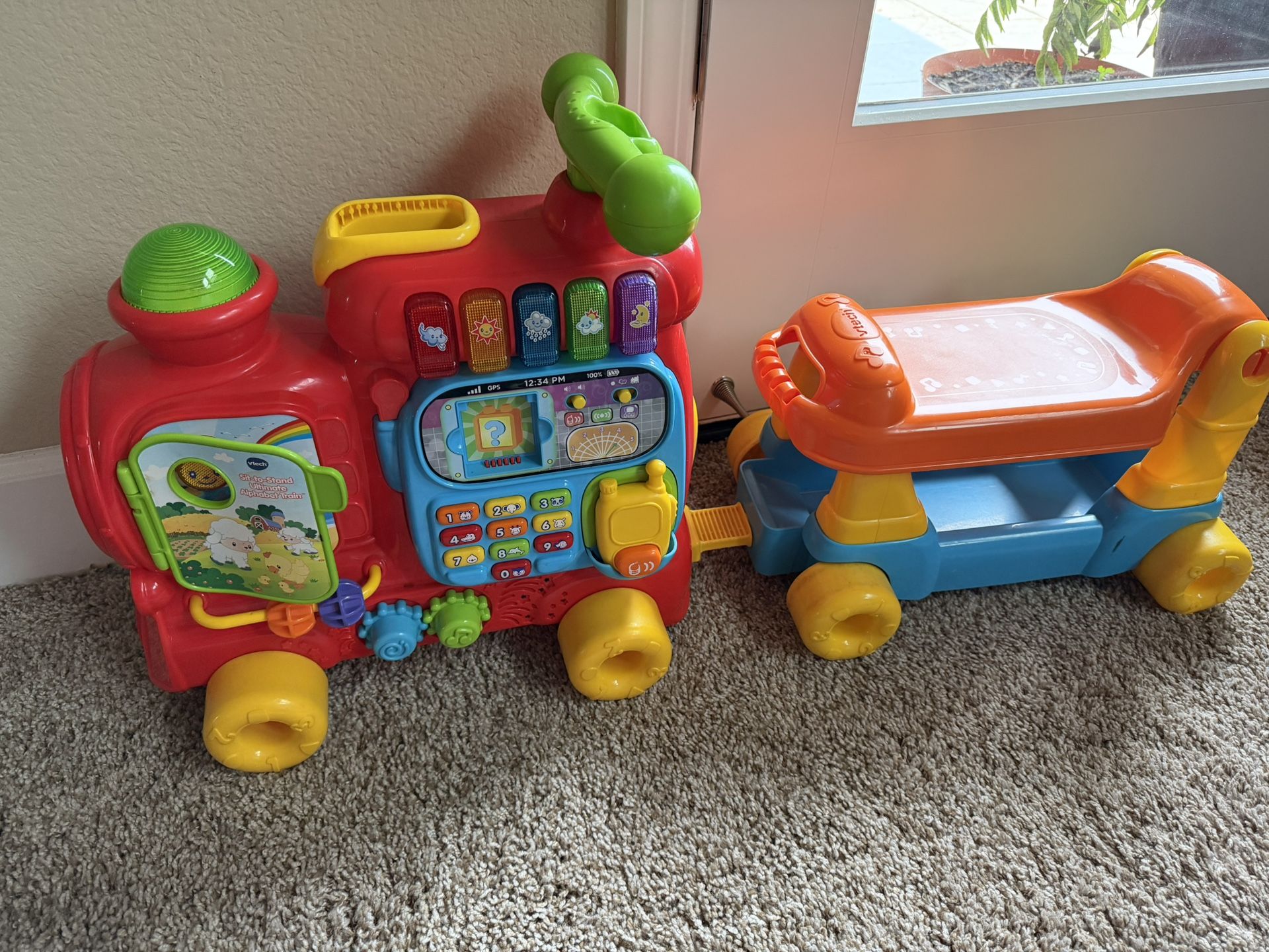 Interactive Learning Train and Ride-On Toy with Educational Features