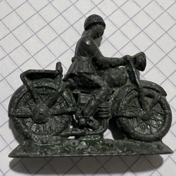 military man on a motorcycle of the USSR 50-70 years old material tin metal